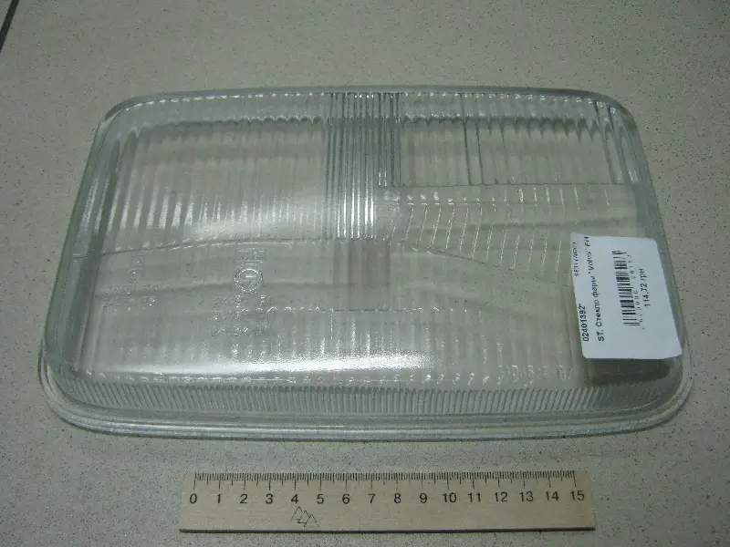 Скло фар “Volvo” FH