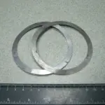 Шайба задньої маточини регулювальна