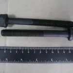 Болт головки блоку